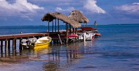 pier-and-speed-boats-ambergris-caye