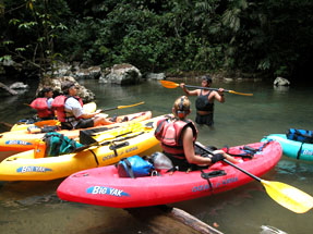 Neri Chi gives beginning kayak lessons at the Caves Branch River put-in.