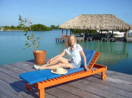 Sitting on the dock at private St. George's Caye Resort